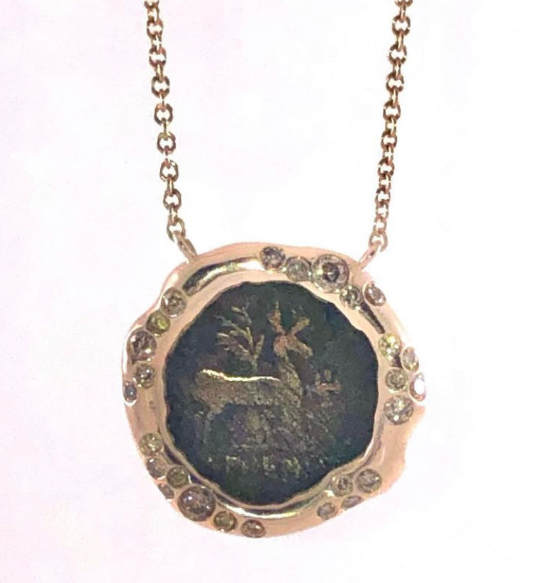 Dear and Stag coin pendant in gold