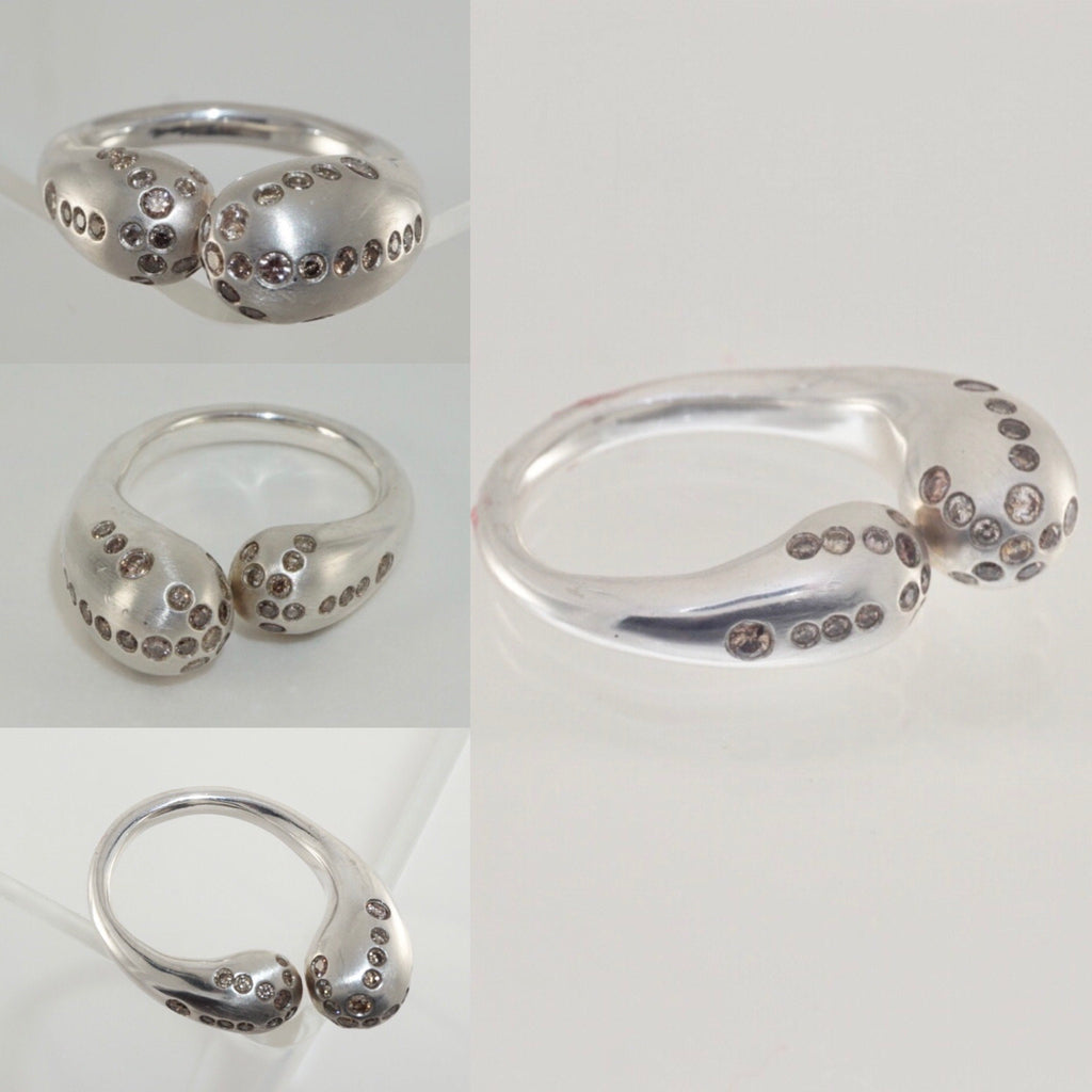 Mercurial diamond-lined ultra-modern silver ring