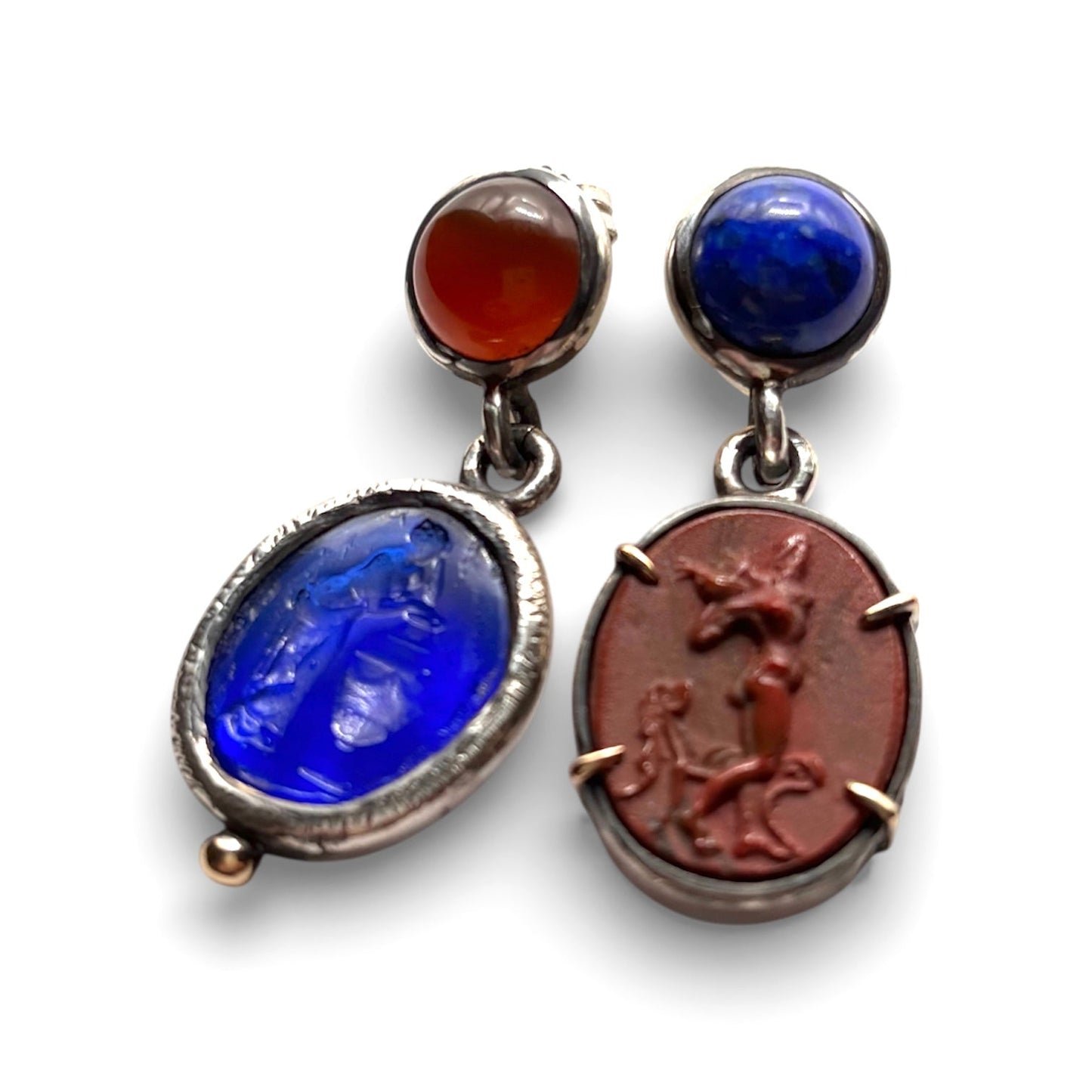 Mismatched Intaglio Silver Earrings with Gold Accents — Intentionally mismatched earrings feature two antique glass