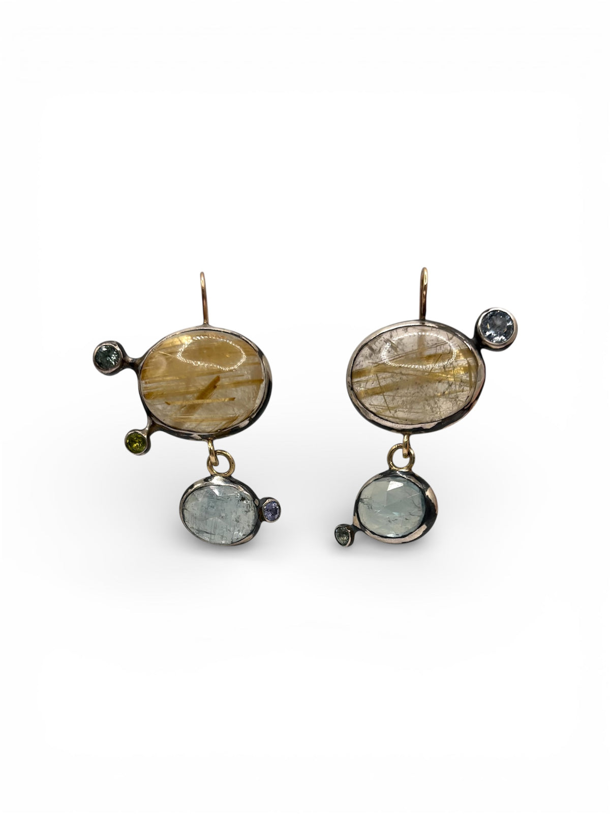 Detail view of Mismatched Asymmetric Rutilated Quartz and Blue Kyanite Dangle Earrings — Gold Rutilated Quartz is contrasting