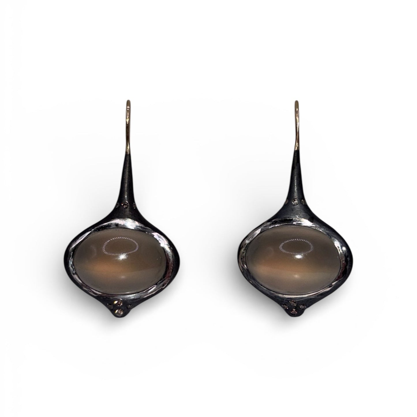 Another view of Grey Oval Moonstone Earrings with Brown Diamond Accents — Oval grey Moonstone cabochons are set in silver, featuring 14k gold affixed earwire, brown diamond accents on top and bottom