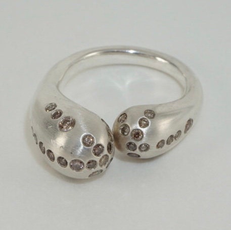 Mercurial diamond-lined ultra-modern silver ring